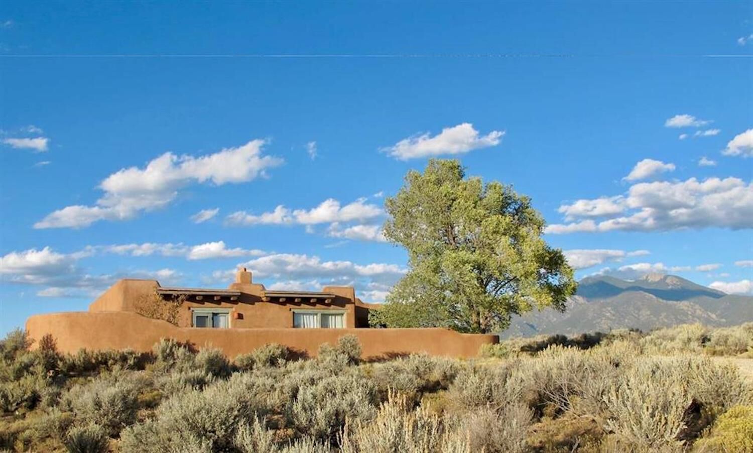 Charming pueblo-style home with incredible views!