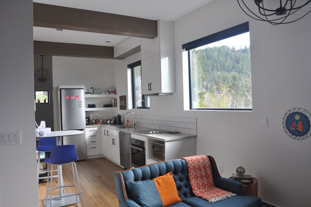 Full apartment with private entry and garage parking in the heart of Rossland.