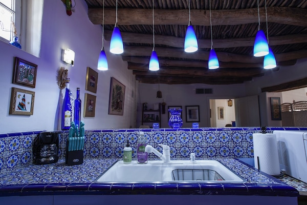 Casita Azul welcomes you as you enter and are greeted with blue tile.