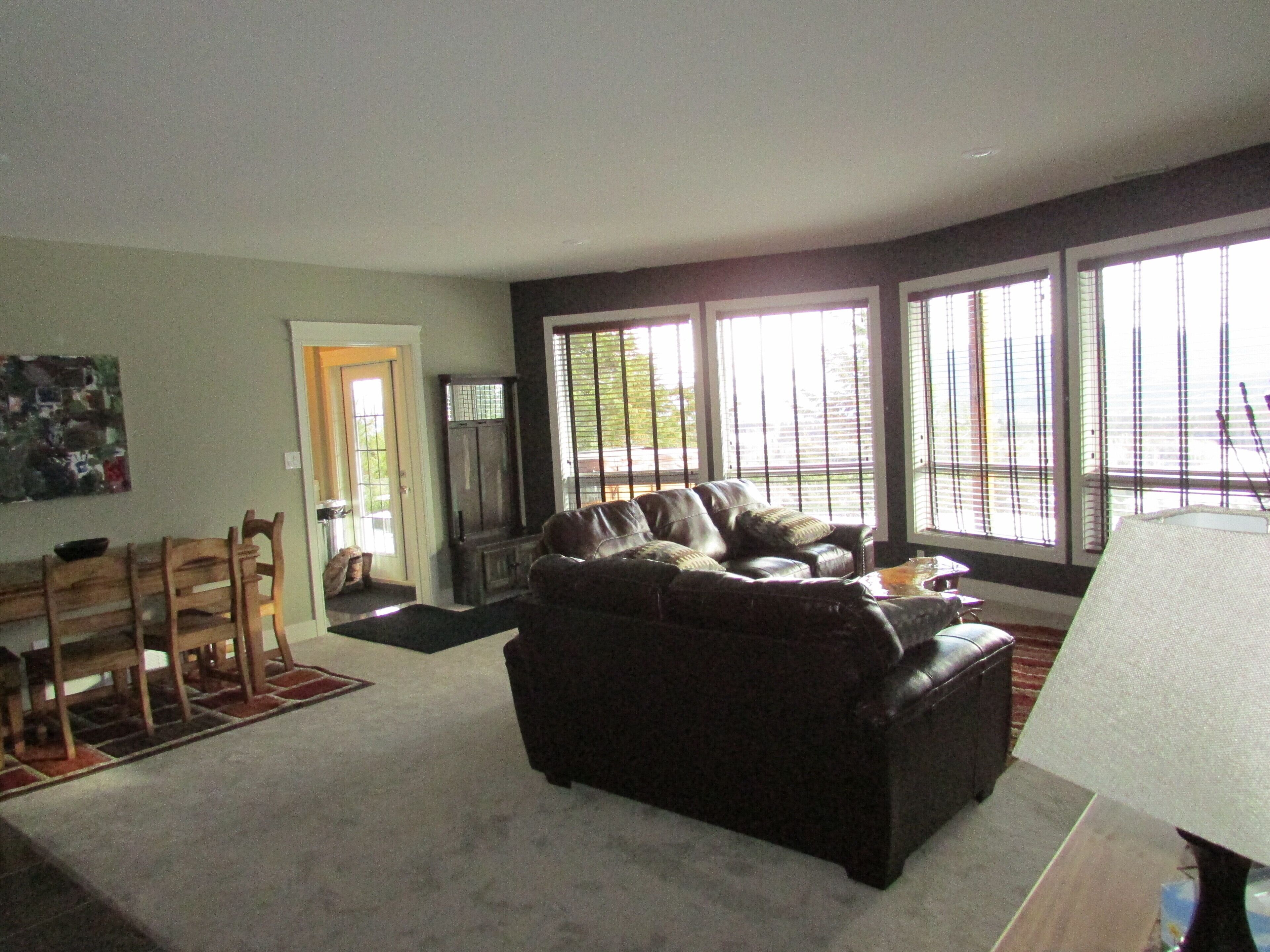 Walk out basement suite at the base of Tecumseh Mountain on 3 acres.