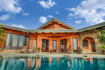 CASA ANTIGUA FROM THE INFINITY EDGE POOL DAYTIME