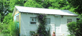 A cozy country "Doll House," with everything to meet your needs.