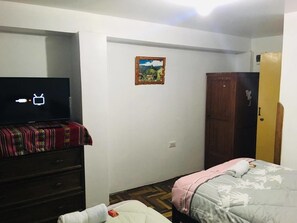 Family Apartment, 3 Bedrooms, Non Smoking, City View | 3 bedrooms, down comforters, blackout drapes, free WiFi - Charos House (Cusco)