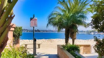 On the beach, sun-loungers, beach towels