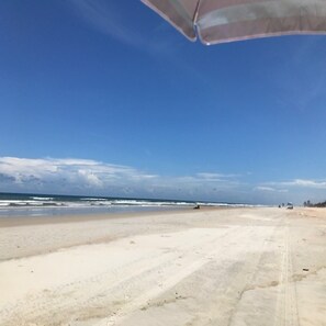 On the beach, sun-loungers, beach towels