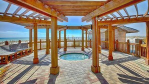 A wooden deck with a pool and beach views. - 1BR/2BA,Gorgeous 10th Floor Oceanfront,  Awesome View! (Destin)