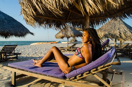 Beach nearby, white sand, beach shuttle, sun loungers. Cap Kimony