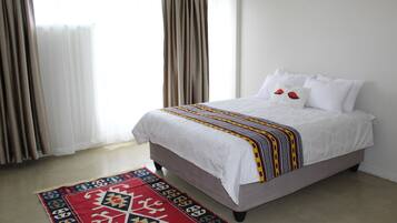 2 bedrooms, premium bedding, iron/ironing board, free WiFi