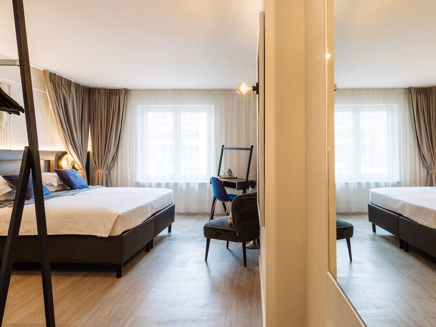 Familiekamer | Een minibar, een kluis op de kamer, babybedden (toeslag), gratis wifi