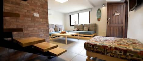 City Duplex, Multiple Beds, Non Smoking, City View | Living room | LCD TV