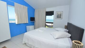 Suíte panorâmica (Vista Mar) | Frigobar, cortinas blackout, Wi-Fi de cortesia, roupa de cama