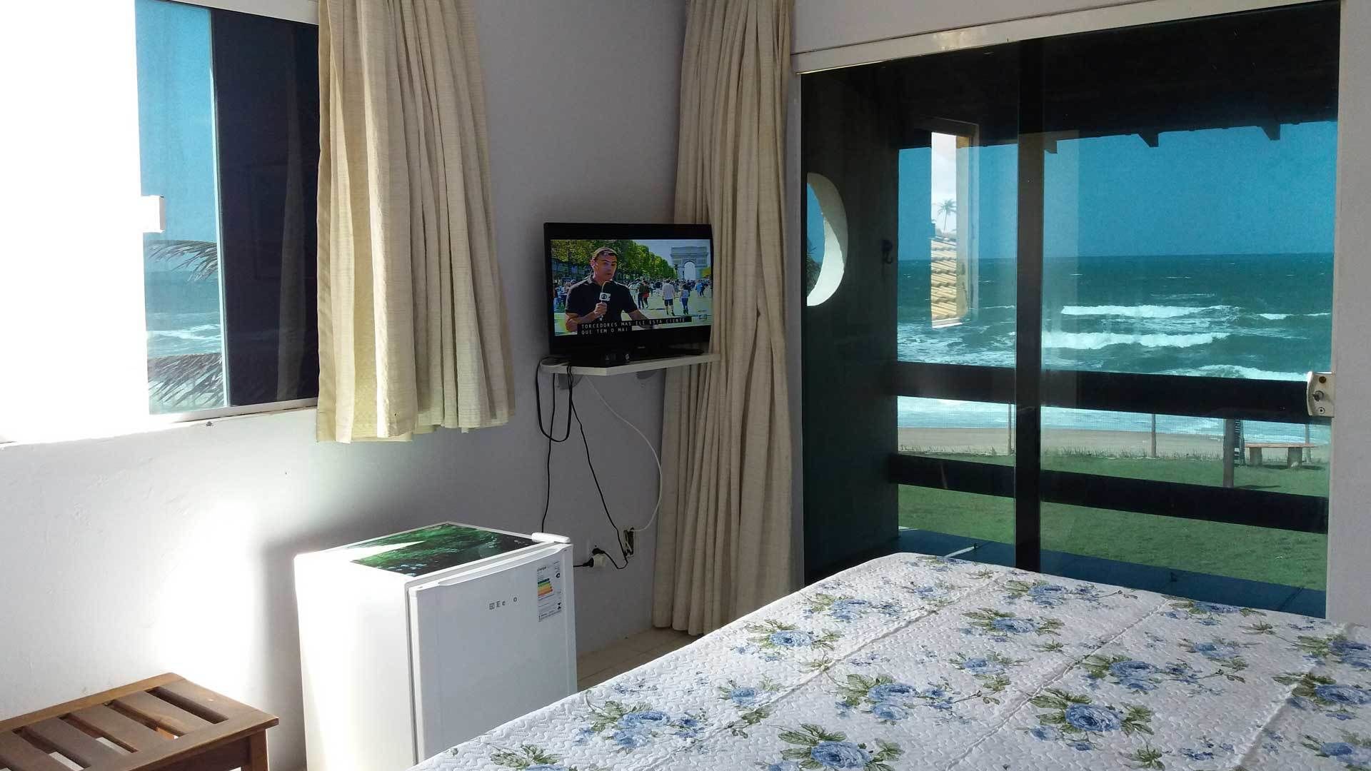 Suíte panorâmica (Vista Mar) | Frigobar, cortinas blackout, Wi-Fi de cortesia, roupa de cama