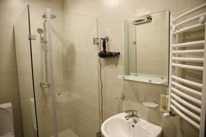 Shower, free toiletries, hair dryer, slippers