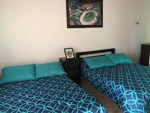 Basic Triple Room, Multiple Beds, Non Smoking | Free WiFi, bed sheets