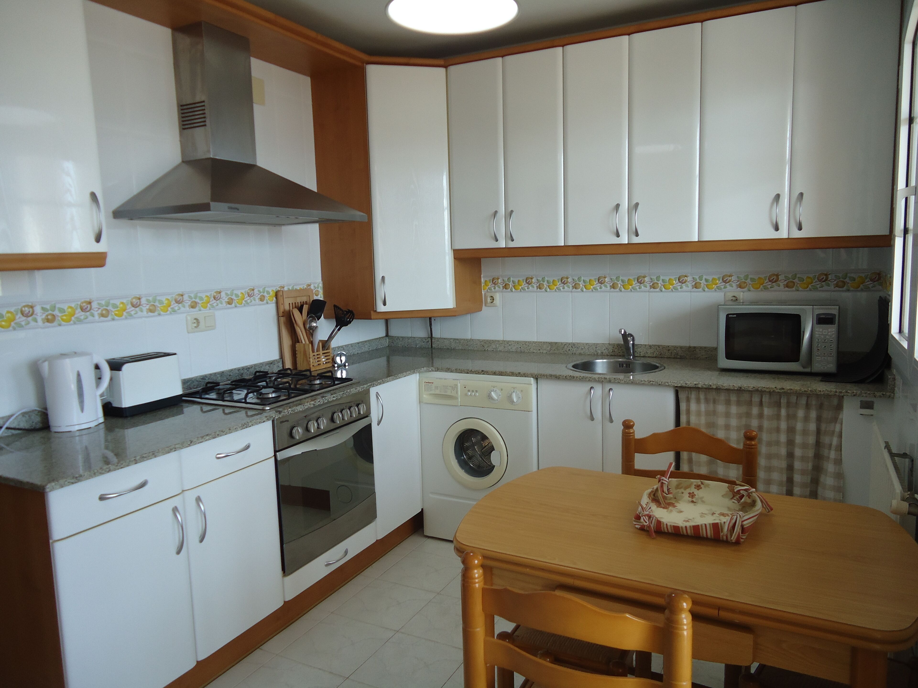 Semi-detached house with private garden and spectacular views over bay and beaches