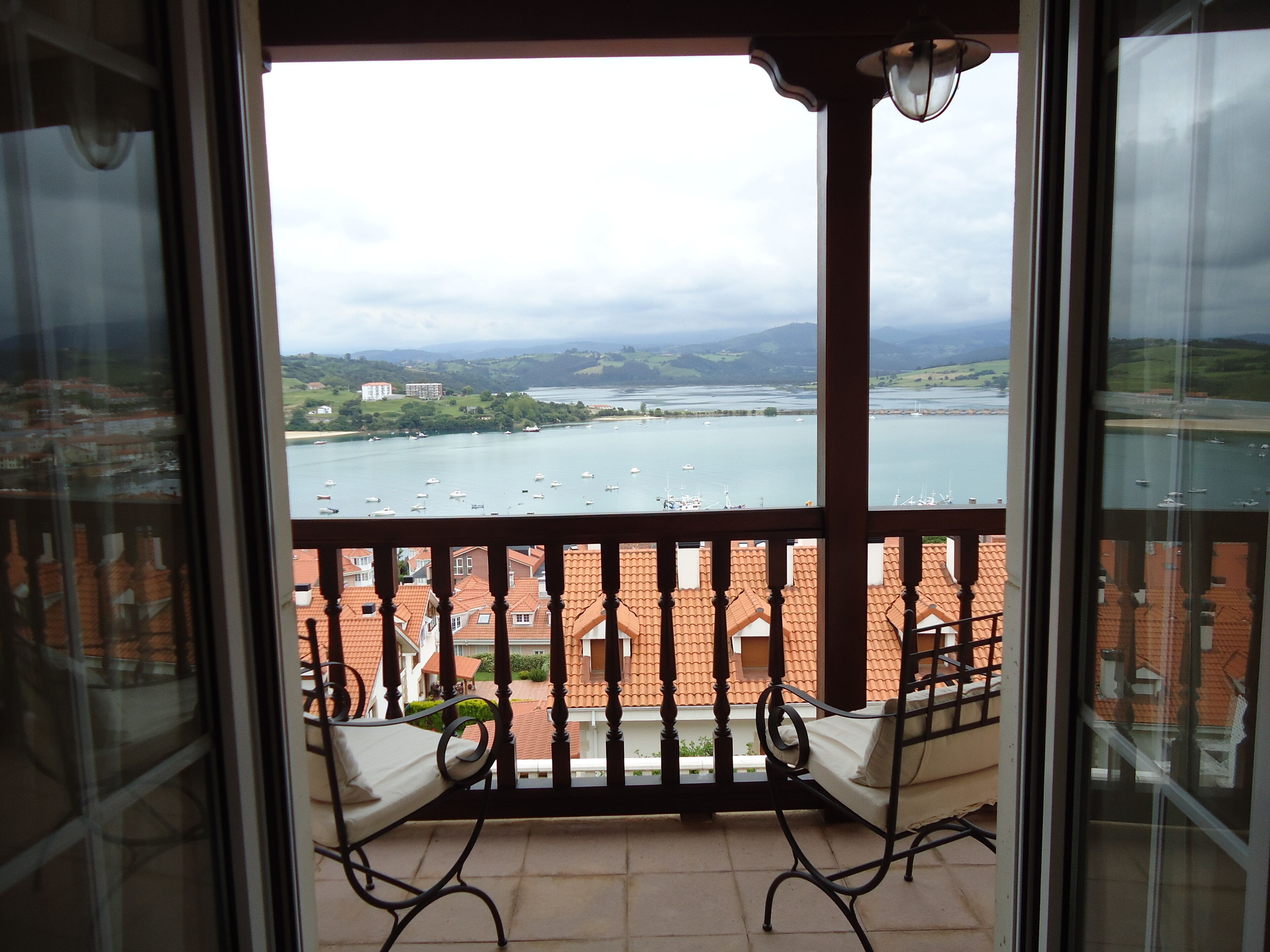 Semi-detached house with private garden and spectacular views over bay and beaches