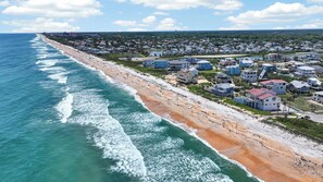 A coastal residential area with beachfront properties and a clear view of the ocean. - Pet Friendly Apartment- Walk To The Beach (Palm Coast)