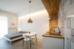 Superior kamer | Een bureau, gratis babybedden, gratis wifi, beddengoed