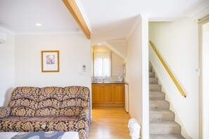 Room 24 Queen Bed and Single with Stairs Standard | Living area