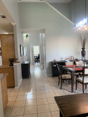 Enjoy a functional kitchen and dining space with a comfortable seating area.
