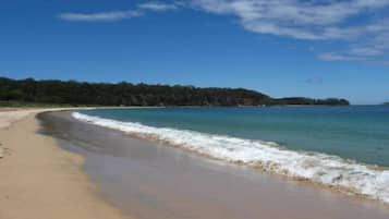 On the beach, sun loungers, beach towels