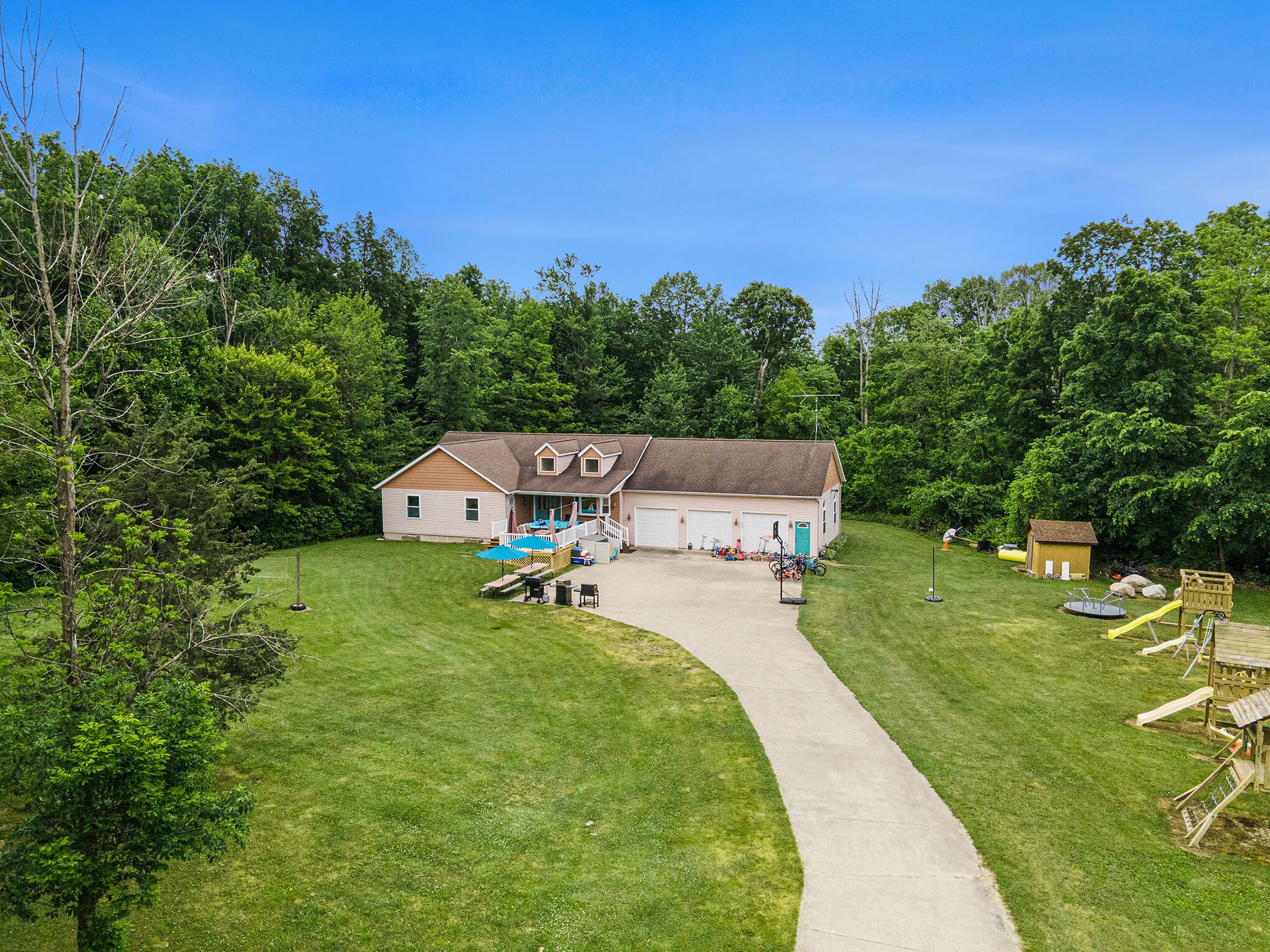 Plenty of parking! Playsets for the kids. Basketball, Cornhole, 