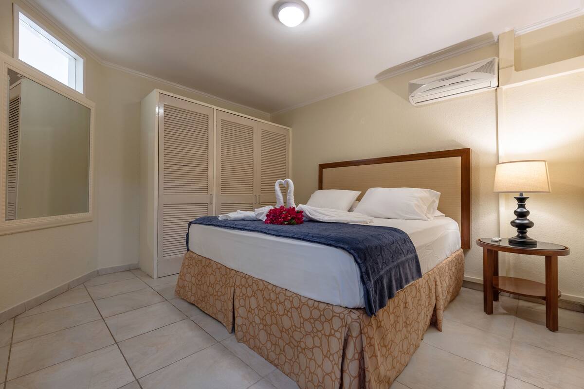 Apartment, 1 Bedroom, Non Smoking | Pillow-top beds, in-room safe, desk, iron/ironing board (on request)