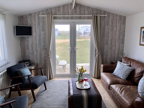 Contemporaine Beach Lodge Avec dunes de sable et la rivière