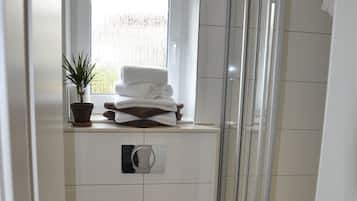 Hair dryer, towels, soap, toilet paper