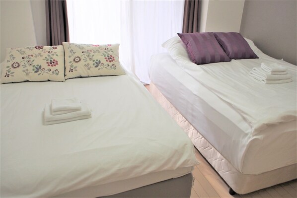 Twin Room, 2 Double Beds, Non Smoking | Free WiFi, bed sheets