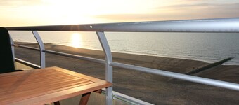 Fantastic view of the North Sea - on the beach promenade with a large balcony