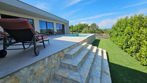 Outdoor pool, a heated pool - Stylish villa *****, heated pool, 2 km from the sea (Rakalj)