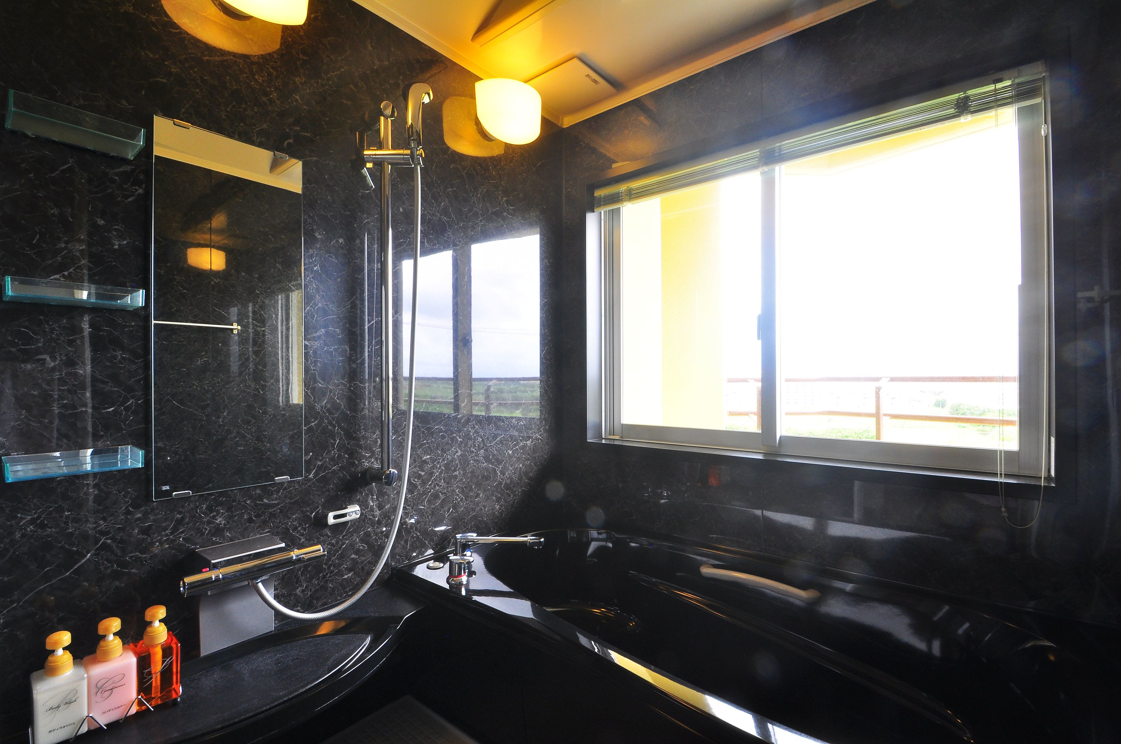 standard twin room, 2 single beds, ocean view | bathroom | separate bathtub and shower, free toiletries, hair dryer, slippers