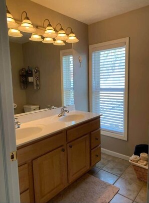 Combined shower/tub, hair dryer, towels, soap