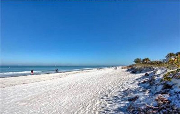 On the beach, sun-loungers, beach towels