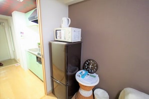 Habitación con 2 camas individuales | Área de sala de estar
