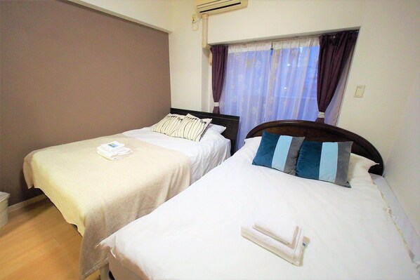 Habitación con 2 camas individuales | Wifi gratis y ropa de cama