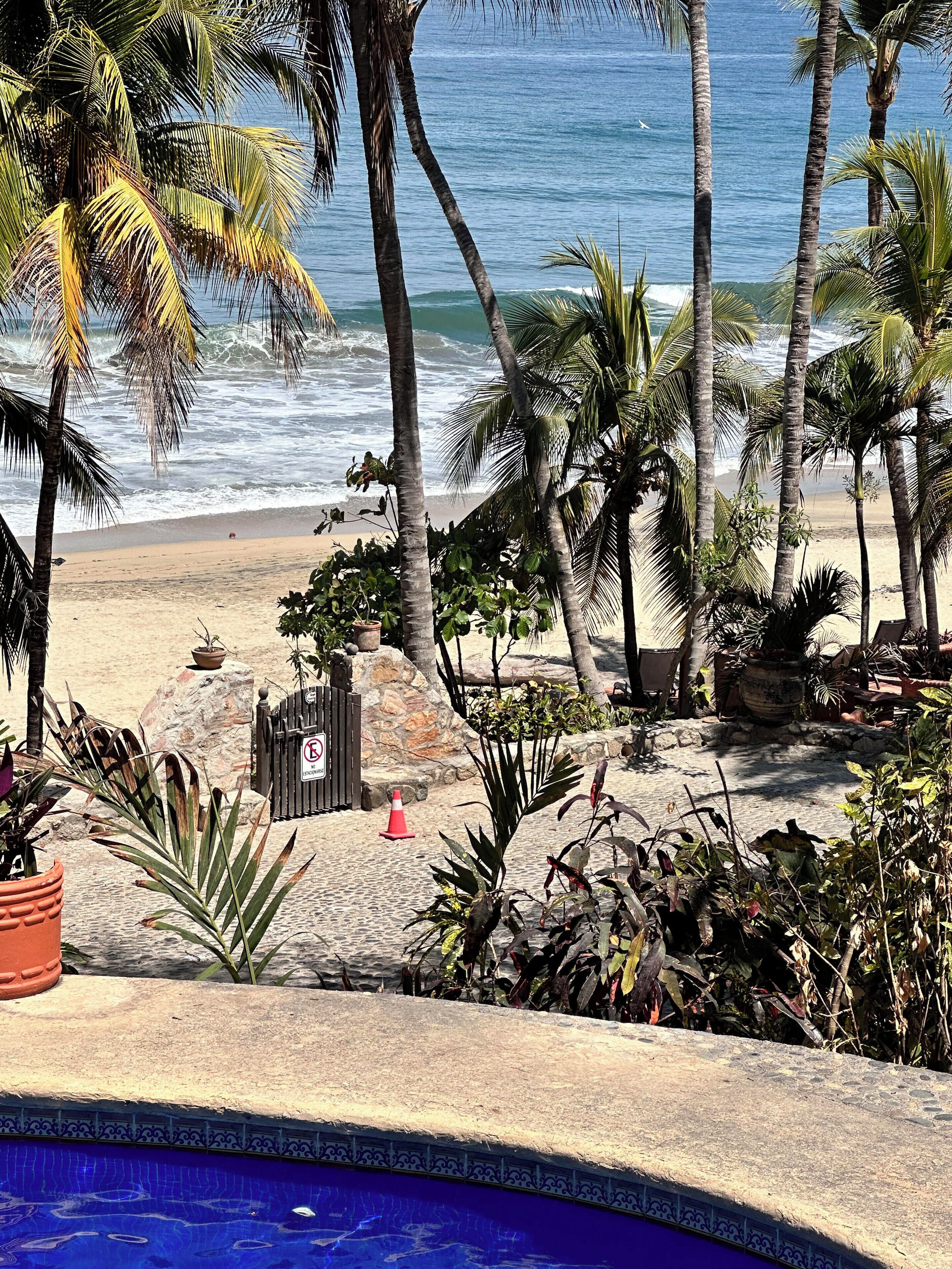 On the beach, sun loungers, beach towels