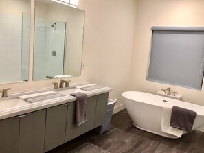 Combined shower/tub, hair dryer, towels, toilet paper