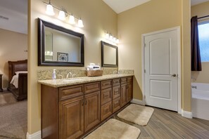 Combined shower/bathtub, hair dryer, towels, toilet paper