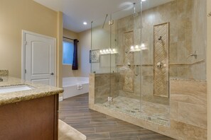 Combined shower/tub, hair dryer, towels, toilet paper