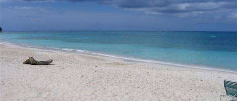 On the beach, sun loungers, beach towels