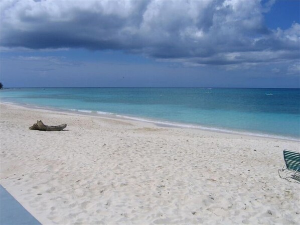 On the beach, sun-loungers, beach towels
