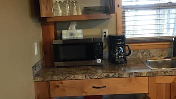 Fridge, microwave, coffee/tea maker, toaster