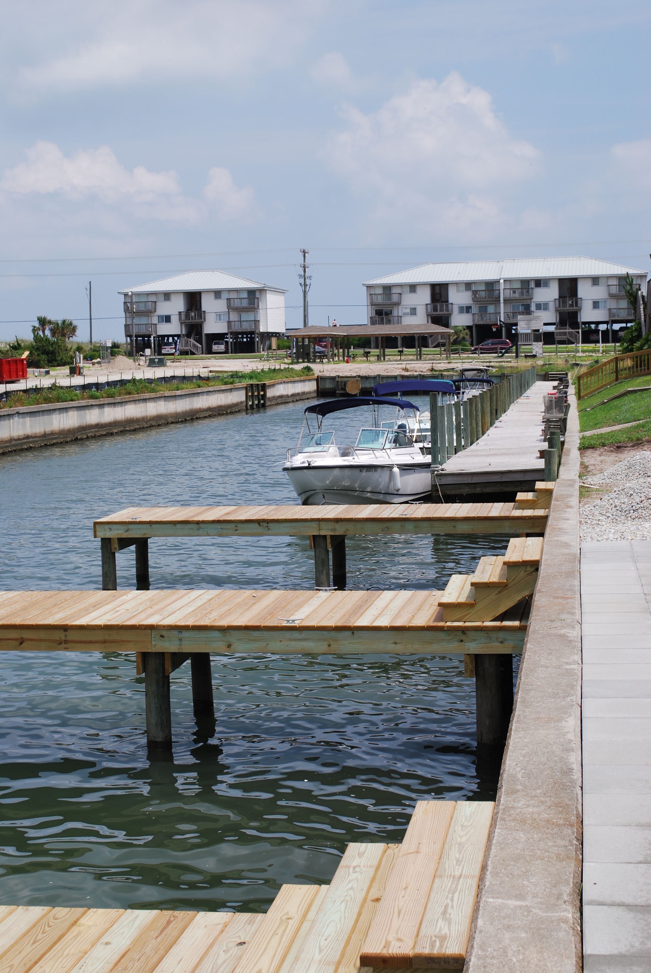 Park your boat and jet skis here, feet away from the house!