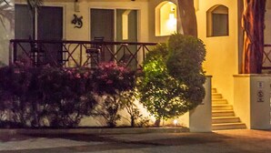 A multi-story building with balconies, staircases, and a courtyard. - Great Location - Just steps from Mamitas Beach and Fifth Avenue ~ Special Rates  (Playa Del Carmen)