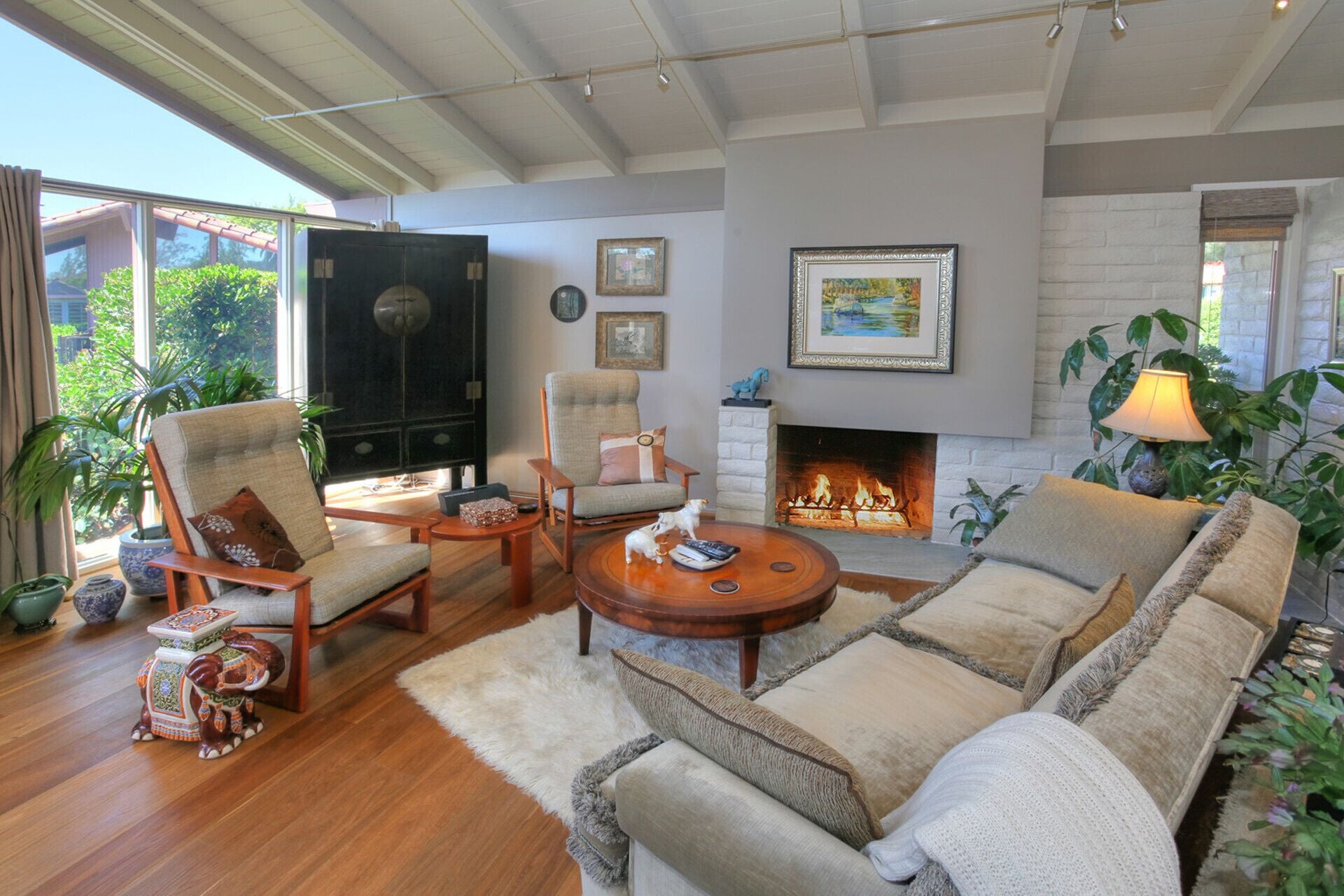 Gas fireplace, 48" Smart TV, art treasures from around the world