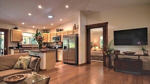 A modern kitchen with wooden cabinets, stainless steel appliances, and a central island. - *Peace and Serenity* (Haiku)