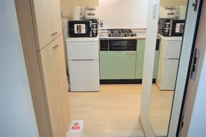 Twin Room | Private kitchen | Fridge, microwave