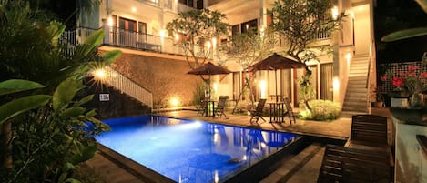 Outdoor pool, open 6:00 AM to 10:00 PM, pool umbrellas, pool loungers